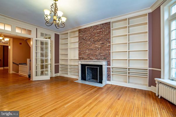 Chandelier, Empty room, Fireplace, Interior, Stone Walls, Wood Texture Flooring