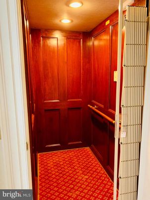 Elevator, Interior, Recessed Lighting, Wooden Walls