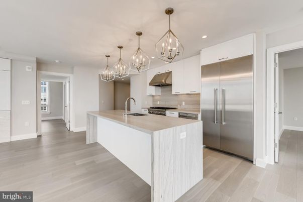 Chandelier, Interior, Kitchen, Pendant Lights, Recessed Lighting, Stainless Steel Appliances, Wood Texture Flooring