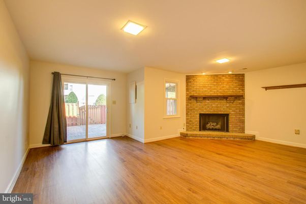Empty room, Fireplace, Interior, Stone Walls, Wood Texture Flooring