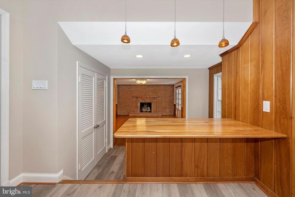 Fireplace, Interior, Pendant Lights, Recessed Lighting, Wood Texture Flooring
