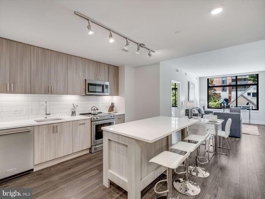 Dining room, Interior, Kitchen, Recessed Lighting, Stainless Steel Appliances, Wood Texture Flooring