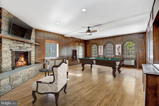Billiard Table, Fireplace, Game Room, Interior, Recessed Lighting, Stone Walls, Wood Texture Flooring, Wooden Walls