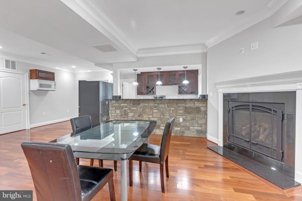 Dining room, Fireplace, Interior, Pendant Lights, Recessed Lighting, Wood Texture Flooring