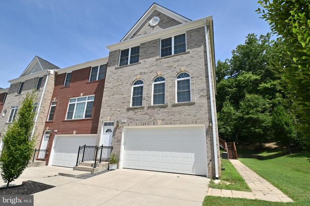 Attached, Exterior, Facade, Brick Facade, Rowhouse