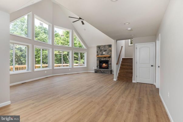 Empty room, Fireplace, Interior, Recessed Lighting, Wood Texture Flooring