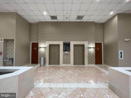 Elevator, Interior, Recessed Lighting, Stone Walls