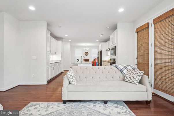 Chandelier, Interior, Kitchen, Living room, Recessed Lighting, Wood Texture Flooring