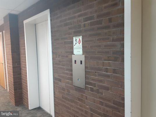 Elevator, Interior, Stone Walls