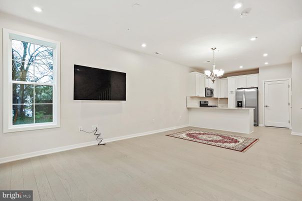 Chandelier, Interior, Kitchen, Pendant Lights, Recessed Lighting, Stainless Steel Appliances, Wood Texture Flooring