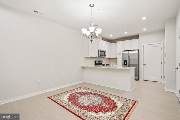 Chandelier, Interior, Kitchen, Recessed Lighting, Stainless Steel Appliances, Wood Texture Flooring