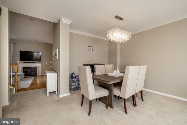 Chandelier, Dining room, Fireplace, Interior, Wood Texture Flooring