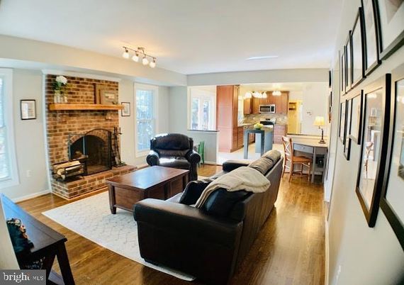 Fireplace, Interior, Kitchen, Living room, Stainless Steel Appliances, Stone Walls, Wood Texture Flooring
