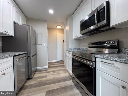 Interior, Kitchen, Recessed Lighting, Stainless Steel Appliances, Wood Texture Flooring