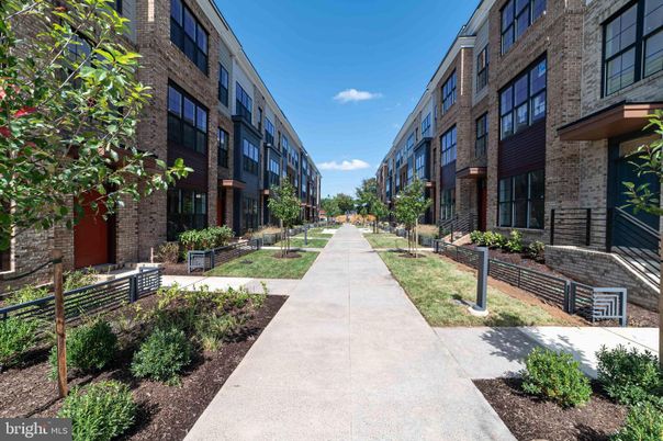 Exterior, Facade, Brick Facade, Condo Building