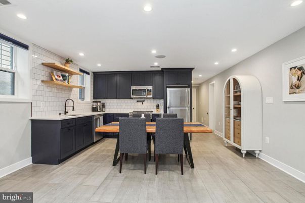 Dining room, Interior, Kitchen, Recessed Lighting, Stainless Steel Appliances, Wood Texture Flooring