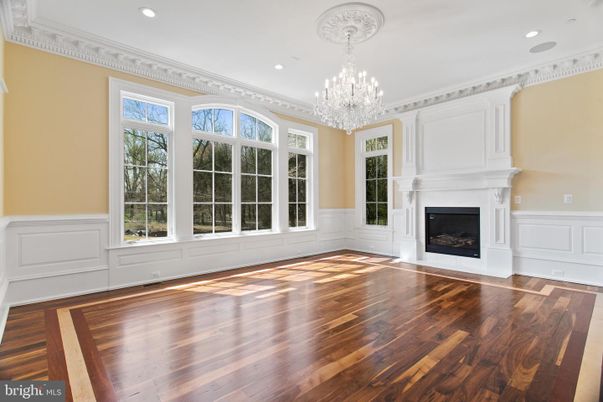 Chandelier, Empty room, Fireplace, Interior, Recessed Lighting, Wood Texture Flooring
