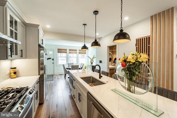 Dining room, Interior, Kitchen, Pendant Lights, Recessed Lighting, Stainless Steel Appliances, Wood Texture Flooring