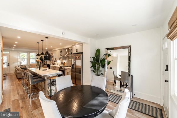 Dining room, Interior, Kitchen, Living room, Pendant Lights, Recessed Lighting, Stainless Steel Appliances, Wood Texture Flooring