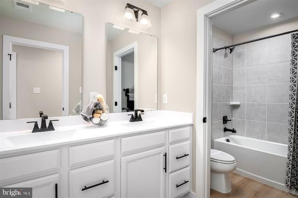 Bathroom, Dual Sink Vanities, Interior, Recessed Lighting, Wood Texture Flooring