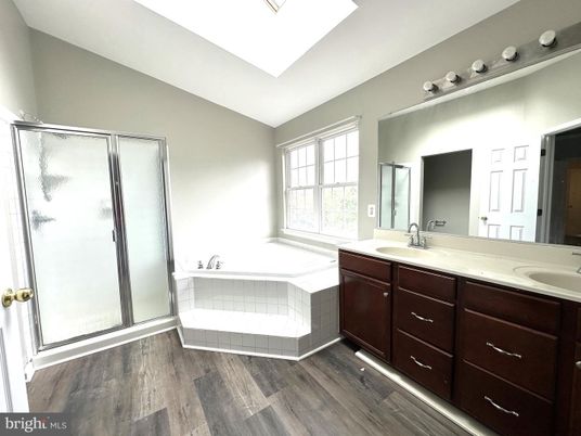 Bathroom, Dual Sink Vanities, Glass Shower, Interior, Wood Texture Flooring