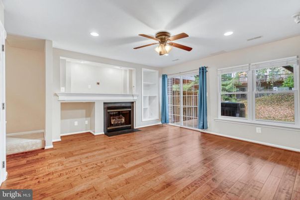 Empty room, Fireplace, Interior, Recessed Lighting, Wood Texture Flooring