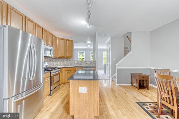 Interior, Kitchen, Pendant Lights, Stainless Steel Appliances, Wood Texture Flooring