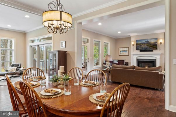 Chandelier, Dining room, Fireplace, Interior, Living room, Recessed Lighting, Wood Texture Flooring