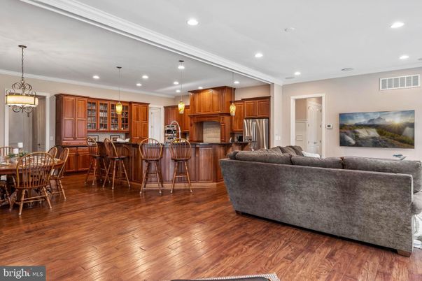 Dining room, Interior, Kitchen, Living room, Pendant Lights, Recessed Lighting, Stainless Steel Appliances, Wood Texture Flooring