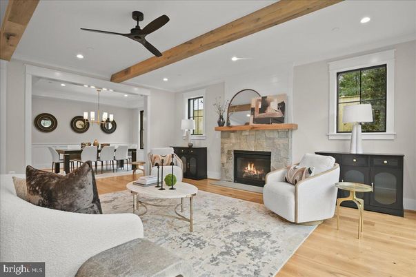 Chandelier, Dining room, Fireplace, Interior, Living room, Pendant Lights, Recessed Lighting, Wooden Beams, Wood Texture Flooring