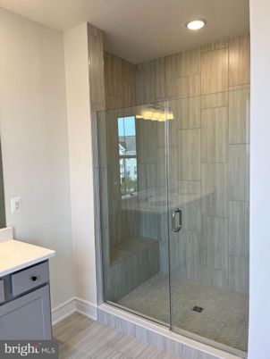 Bathroom, Glass Shower, Interior, Recessed Lighting, Wood Texture Flooring