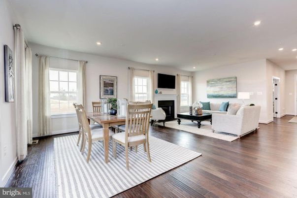 Dining room, Fireplace, Interior, Living room, Recessed Lighting, Wood Texture Flooring