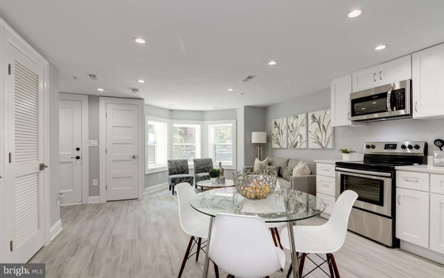 Dining room, Interior, Kitchen, Recessed Lighting, Stainless Steel Appliances, Wood Texture Flooring