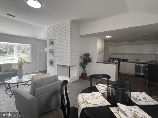 Dining room, Fireplace, Interior, Kitchen, Living room, Recessed Lighting, Stone Walls, Wood Texture Flooring