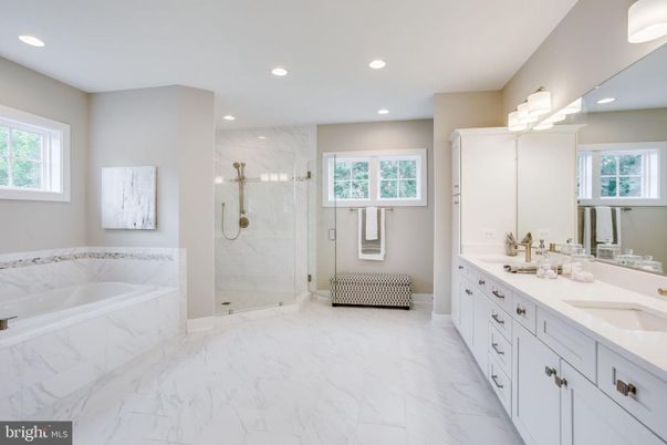 Bathroom, Dual Sink Vanities, Glass Shower, Interior, Marble, Marble Walls, Recessed Lighting