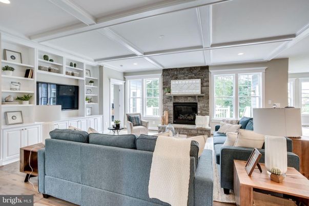 Fireplace, Interior, Living room, Recessed Lighting, Stone Walls, Wood Texture Flooring
