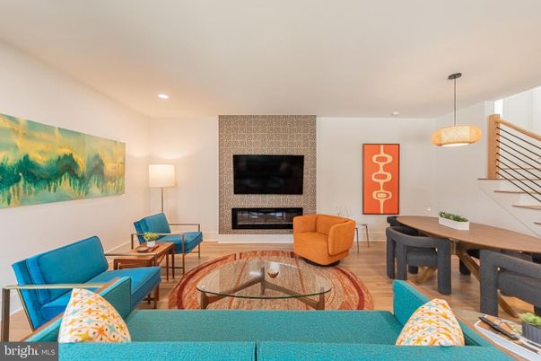 Dining room, Fireplace, Interior, Living room, Pendant Lights, Recessed Lighting, Wood Texture Flooring