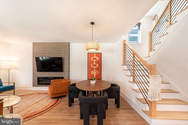 Dining room, Fireplace, Interior, Pendant Lights, Wood Texture Flooring