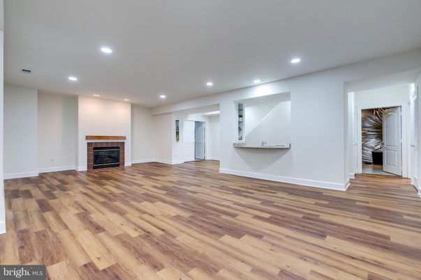 Empty room, Fireplace, Interior, Recessed Lighting, Wood Texture Flooring