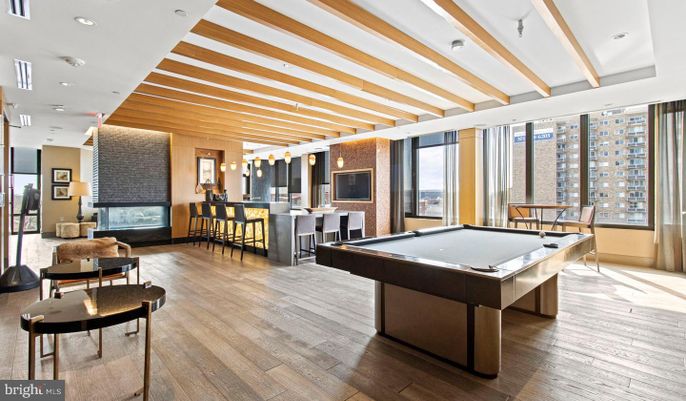 Billiard Table, Fireplace, Game Room, Interior, Pendant Lights, Recessed Lighting, Wooden Beams, Wood Texture Flooring