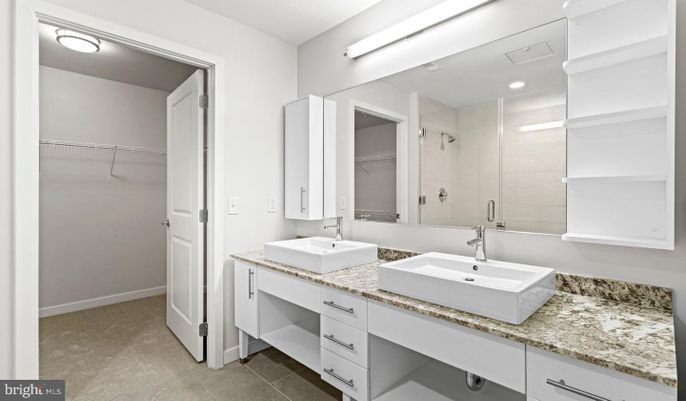 Bathroom, Dual Sink Vanities, Interior, Recessed Lighting, Walk-in Closets
