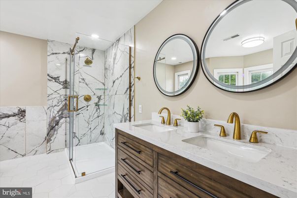 Bathroom, Dual Sink Vanities, Glass Shower, Interior, Marble Walls, Recessed Lighting