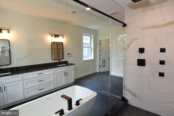 Bathroom, Dual Sink Vanities, Glass Shower, Interior, Marble Walls, Recessed Lighting