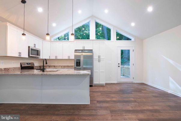 Interior, Kitchen, Pendant Lights, Recessed Lighting, Stainless Steel Appliances, Wood Texture Flooring