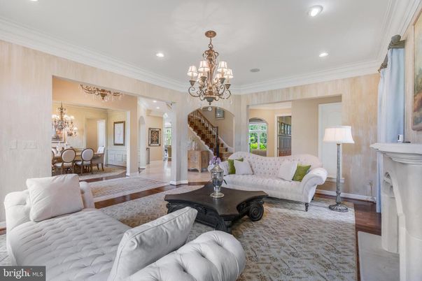 Chandelier, Dining room, Fireplace, Interior, Living room, Recessed Lighting, Wood Texture Flooring
