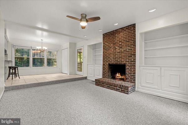 Chandelier, Empty room, Fireplace, Interior, Recessed Lighting, Stone Walls