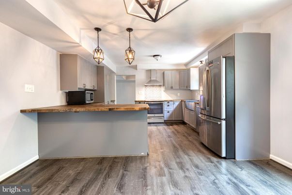 Interior, Kitchen, Pendant Lights, Stainless Steel Appliances, Wood Texture Flooring