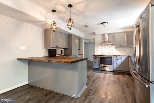 Interior, Kitchen, Pendant Lights, Stainless Steel Appliances, Wood Texture Flooring