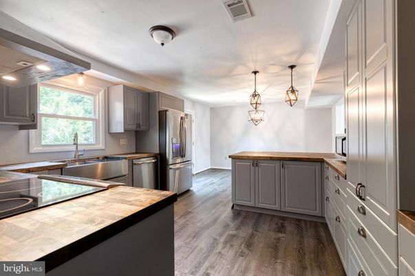 Interior, Kitchen, Pendant Lights, Stainless Steel Appliances, Wood Texture Flooring