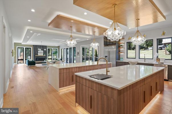 Chandelier, Interior, Kitchen, Living room, Pendant Lights, Recessed Lighting, Stainless Steel Appliances, Wood Texture Flooring